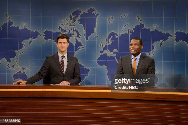 Chris Pratt" Episode 1663 -- Pictured: Colin Jost and Michael Che during the "Weekend Update" skit on September 27, 2014 --