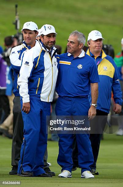 Europe team captain Paul McGinley , Europe team vice captain Jose Maria Olazabal and Europe team vice captain Padraig Harrington celebrate winning...