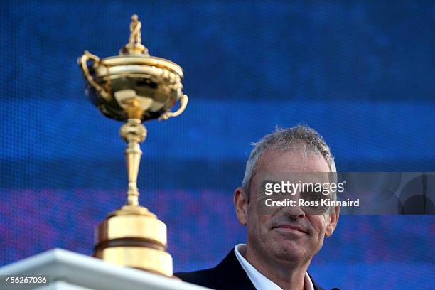 Europe team captain Paul McGinley poses with the Ryder Cup trophy after the Singles Matches of the 2014 Ryder Cup on the PGA Centenary course at the...