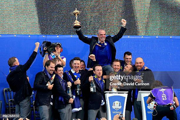 Europe team captain Paul McGinley celebrates winning the Ryder Cup with his team after the Singles Matches of the 2014 Ryder Cup on the PGA Centenary...