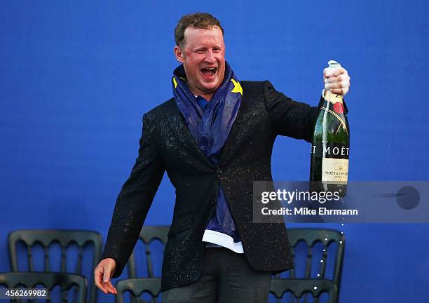 Jamie Donaldson of Europe celebrates winning the Ryder Cup after the Singles Matches of the 2014 Ryder Cup on the PGA Centenary course at the...