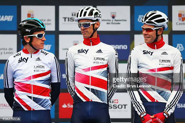 Geraint Thomas; David Millar and Luke Rowe arrive to sign on at the start of the Elite Men's Road Race on day seven of the UCI Road World...