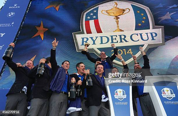 Europe team captain Paul McGinley celebrates winning the Ryder Cup with his team after the Singles Matches of the 2014 Ryder Cup on the PGA Centenary...