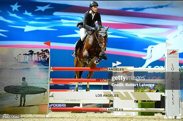 Third place finisher Carlos Hank Guerreiro of Mexico rides Cedino K during the Ecuries d' Ecaussinnes Grand Prix class as part of the Longines Los...