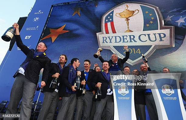 Europe team captain Paul McGinley celebrates winning the Ryder Cup with his team after the Singles Matches of the 2014 Ryder Cup on the PGA Centenary...