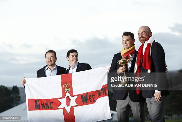 Graeme McDowell of Northern Ireland, Rory McIlroy of Northern Ireland, Martin Kaymer of Germany and Thomas Bjorn of Denmark pose for pictures with...