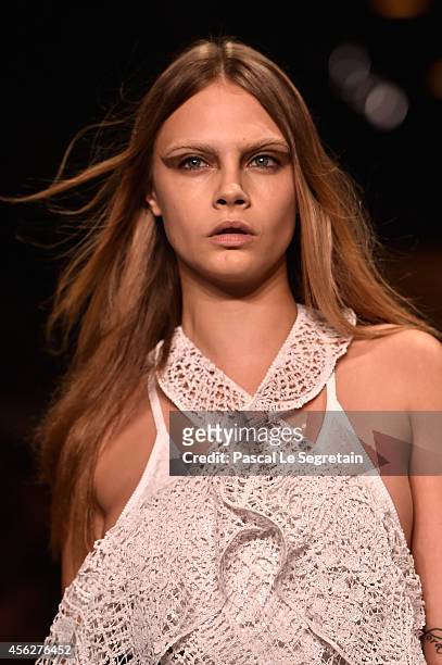 Model Cara Delevingne walks the runway during the Givenchy show as part of the Paris Fashion Week Womenswear Spring/Summer 2015 on September 28, 2014...