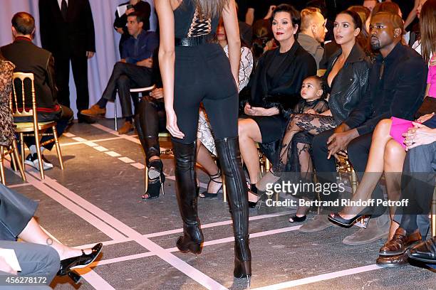 Mother of Kim Kardashian, Kris Jenner, Kim Kardashian, Kanye West and their daughter North West attend the Givenchy show as part of the Paris Fashion...