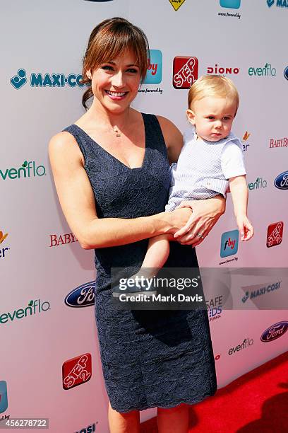 Actress Nikki DeLoach and William Hudson Goodell attend the 3rd annual red CARpet safety awareness event presented by Favored.by, Diono And Evenflo...