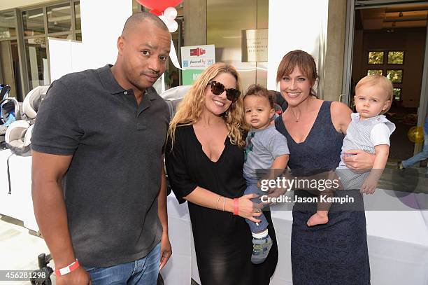 Actor Donald Faison, CaCee Cobb, Rocco Faison, actress Nikki DeLoach and William Hudson Goodell attend the 3rd annual red CARpet safety awareness...