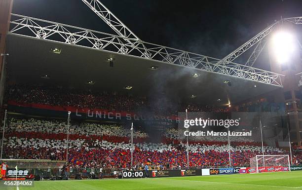 The Genoa CFC fans show their support before the Serie A match between Genoa CFC and UC Sampdoria at Stadio Luigi Ferraris on September 28, 2014 in...