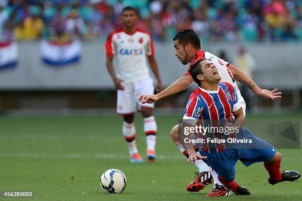 Henrique of Bahia battles for the ball during the match between Bahia and Flamengo as part of Brasileirao Series A 2014 at Arena Fonte Nova on...