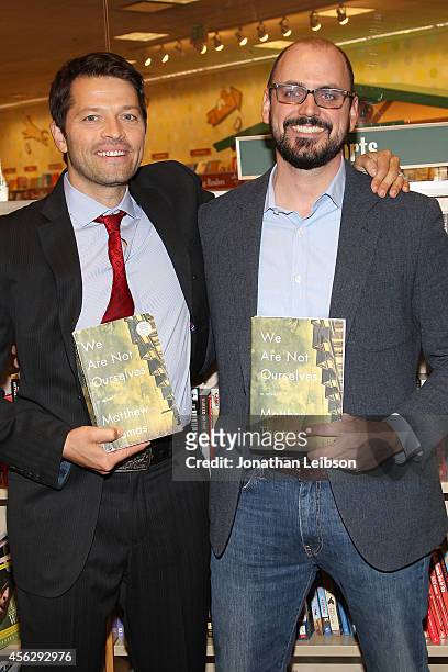 Misha Collins and Matthew Thomas attend the Matthew Thomas at Barnes & Noble bookstore at The Grove on September 28, 2014 in Los Angeles, California.