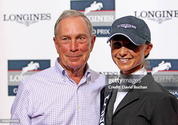 Former New York Mayor Michael Bloomberg poses with his daughter third place finisher Georgina Bloomberg after the Longines Grand Prix class event...