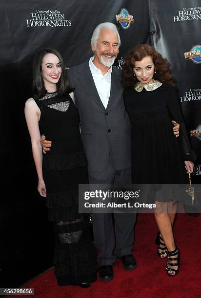 Special Effects Makeup Artist Rick Baker, daughter Veronica Baker and wife Silvia Abascal arrive for Universal Studios Hollywood "Halloween Horror...
