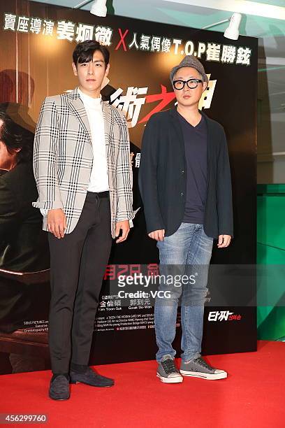 Director Hyeong-cheol Kang and T.O.P of BigBang attend Hyeong-cheol Kang's new movie "Tazza 2" press conference on September 28, 2014 in Hong Kong,...