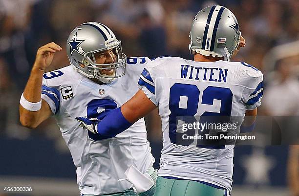 Tony Romo of the Dallas Cowboys and Jason Witten of the Dallas Cowboys celebrate after scoring a touchdown against the New Orleans Saints in the...