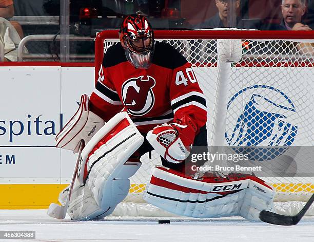 Scott Clemmensen of the New Jersey Devils tends net against the Philadelphia Flyers at the Prudential Center on September 28, 2014 in Newark, New...