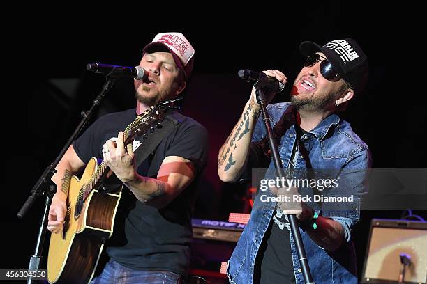 Chris Lucas and Preston Brust of the LoCash Cowboys perform onstage at the Paradigm Agency at the Paradigm Party during Day 2 of the IEBA 2014...