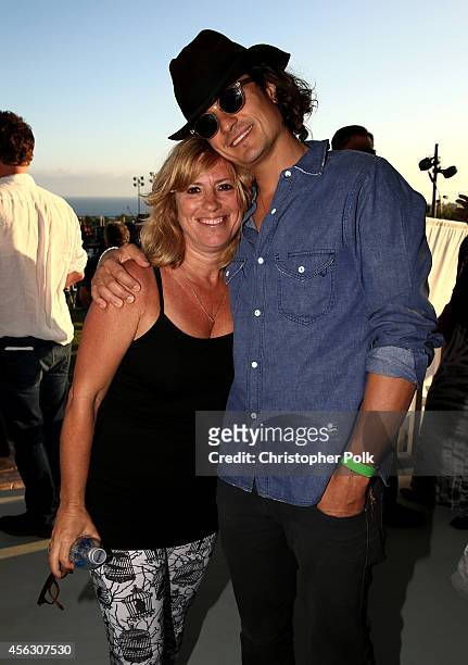 Andrea Pett-Joseph and actor Orlando Bloom attend Rock4EB, Malibu, with Jackson Browne & David Spade sponsored by Suja Juice & Sabra Hummus at...