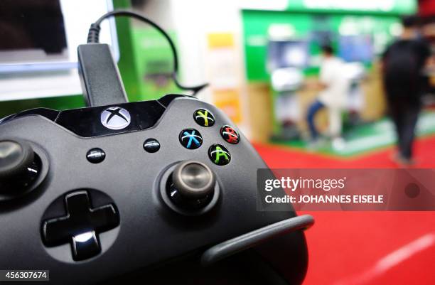 Control of a Microsoft's Xbox One game console is pictured in a shop in Shanghai on September 29, 2014. The Xbox One launched in China, the first...