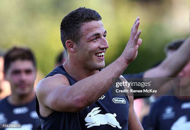 Sam Burgess waves to the fans during a South Sydney Rabbitohs NRL training session at Redfern Oval on September 29, 2014 in Sydney, Australia.