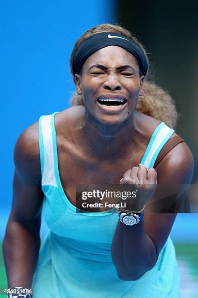 Serena Williams of the United States celebrates a ball against Silvia Soler-Espinosa of Spain during day three of the China Open at the China...