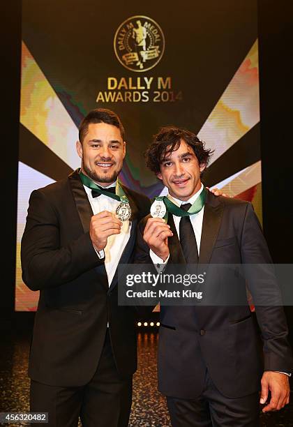 Jarryd Hayne and Johnathan Thurston pose after being presented as joint winners of the Dally M Medal at the Dally M Awards at Star City on September...