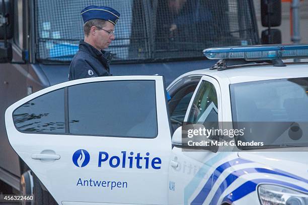 Police secure the Justitiepaleis during the Sharia4Belgium trial on September 29, 2014 in Antwerpen, Belgium. Today starts the trial of 46 defendants...