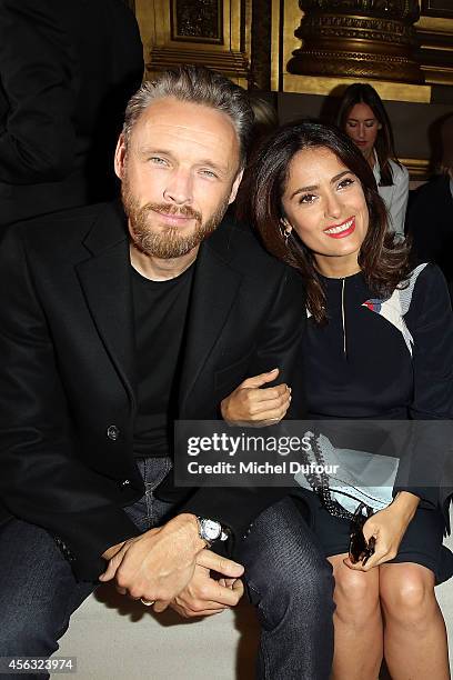 Alasdhair Willis and Salma Hayek attend the Stella McCartney show as part of the Paris Fashion Week Womenswear Spring/Summer 2015 on September 29,...