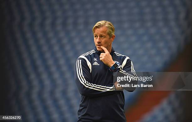 Head coach Jens Keller looks on during a FC Schalke 04 training session prior to their UEFA Champions League match against NK Maribor at Veltins...