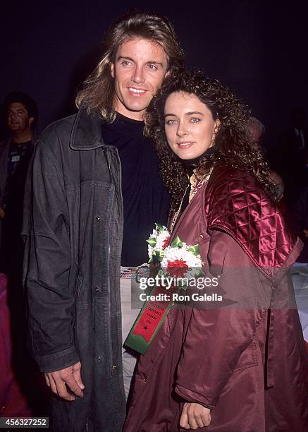 Actor Wolf Larson and actress Lydie Denier attend the 60th Annual Hollywood Christmas Parade on December 1, 1991 at the KTLA Studios in Hollywood,...