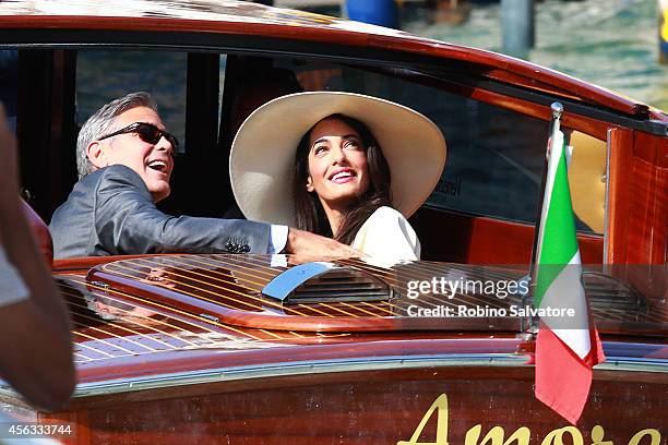 George Clooney and Amal Alamuddin sighted on the way to their civil wedding at Canal Grande on September 29, 2014 in Venice, Italy.