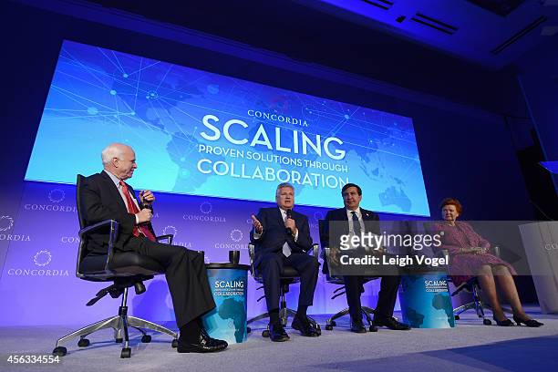 John McCain, Aleksander Kwasniewski, Mikheil Saakashvili and Vaira Vike-Freiberga appear onstage at the 2014 Concordia Summit - Day 1 at Grand Hyatt...