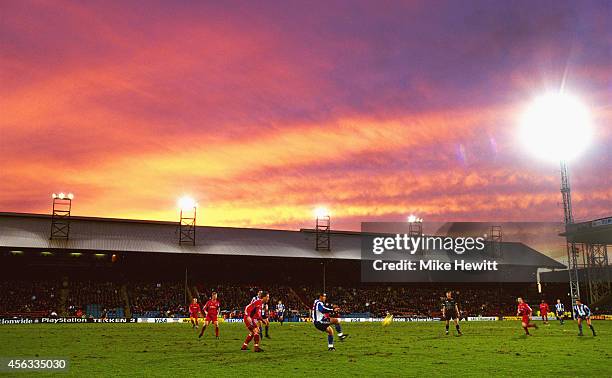 The sun sets over Selhurst Park during a Crystal Palace match circa 1992.