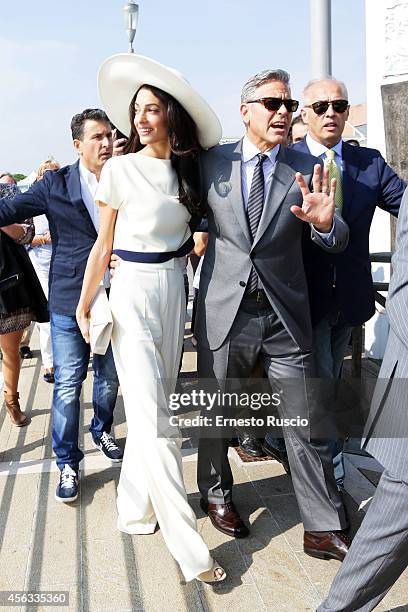 George Clooney and Amal Alamuddin sighting at Marco Polo Airport on September 29, 2014 in Venice, Italy.