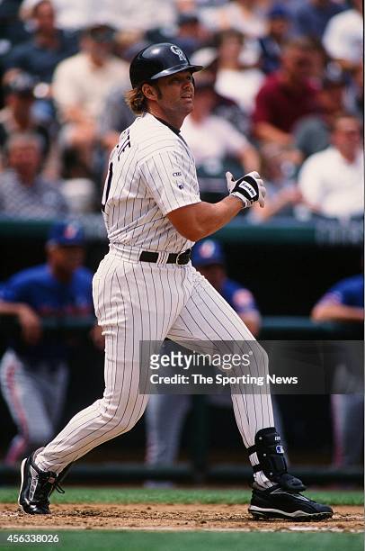 Dante Bichette of the Colorado Rockies bats against the Montreal Expos at Coors Field on August 15, 1999 in Denver, Colorado.