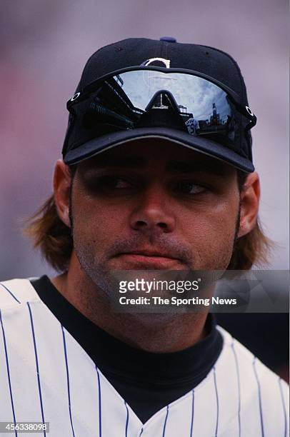 Dante Bichette of the Colorado Rockies looks on against the Montreal Expos at Coors Field on August 15, 1999 in Denver, Colorado.