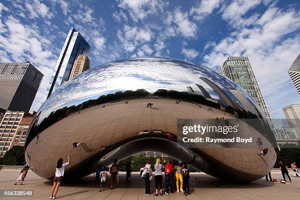 Anish Kapoor's Cloud Gate sculpture sits in Millennium Park on August 27, 2014 in Chicago, Illinois.