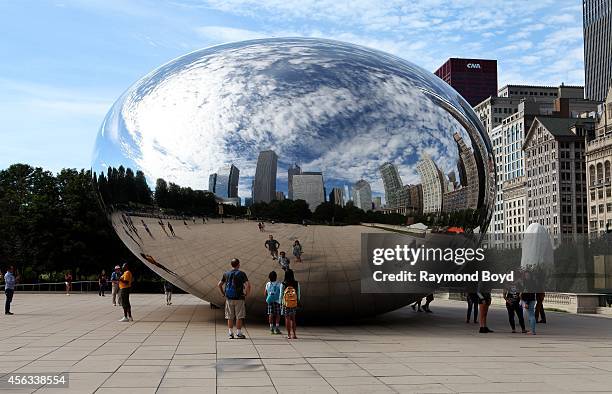 Anish Kapoor's Cloud Gate sculpture sits in Millennium Park on August 27, 2014 in Chicago, Illinois.