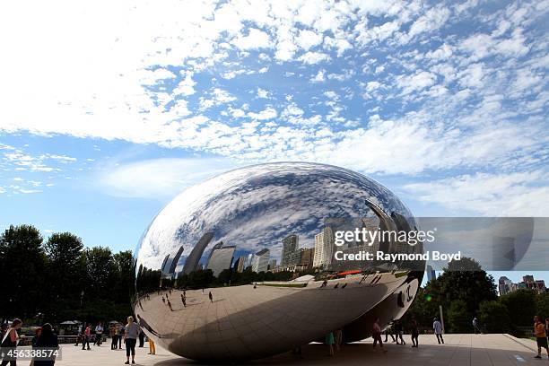 Anish Kapoor's Cloud Gate sculpture sits in Millennium Park on August 27, 2014 in Chicago, Illinois.