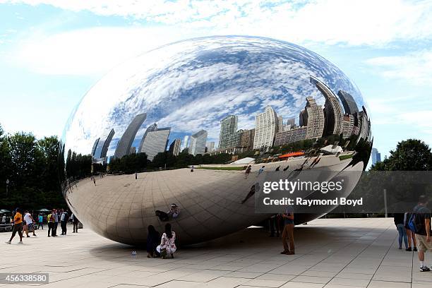 Anish Kapoor's Cloud Gate sculpture sits in Millennium Park on August 27, 2014 in Chicago, Illinois.