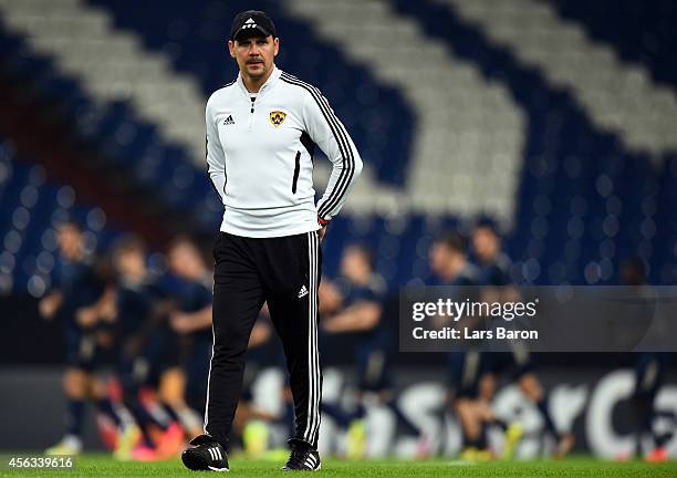 Head coach Ante Simundza looks on during a NK Maribor training session prior to their Champions League match against FC Schalke 04 at Veltins Arena...