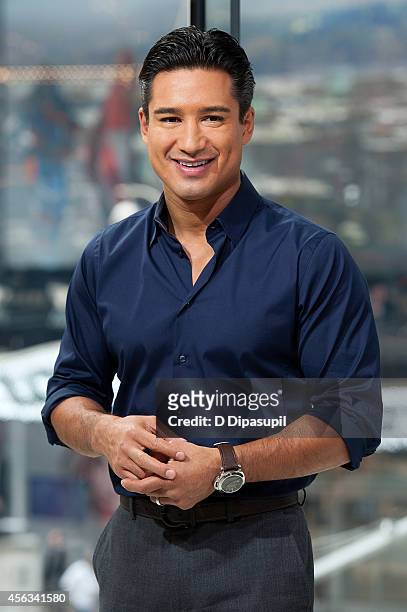 Mario Lopez hosts "Extra" at their New York studios at H&M in Times Square on September 29, 2014 in New York City.