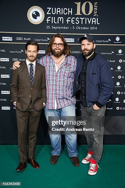 Tom Schilling, Antoine Monot Jr. And director Baran bo Odar attend the 'Who am I' Green Carpet Arrivals during Day 5 of Zurich Film Festival 2014 on...