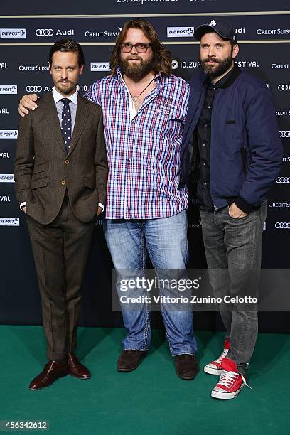 Tom Schilling, Antoine Monot Jr. And director Baran bo Odar attend the 'Who am I' Green Carpet Arrivals during Day 5 of Zurich Film Festival 2014 on...