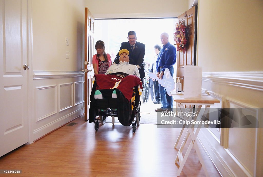 Quadriplegic War Veteran Receives New Specially-Built Home