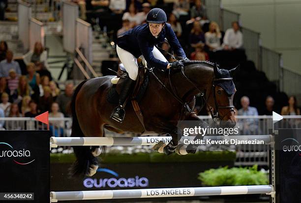 Rider Saer Coulter rides Springtime during the Longines Grand Prix class as part of the Longines Los Angeles Masters at Los Angeles Convention Center...