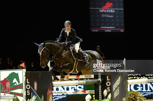 Rider Pieter Devos of Belgium rides Dream of India Greenfield during the Longines Grand Prix class as part of the Longines Los Angeles Masters at Los...