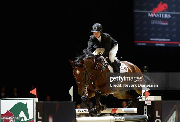 Rider Elizabeth Madden rides Simon during the Longines Grand Prix class as part of the Longines Los Angeles Masters at Los Angeles Convention Center...